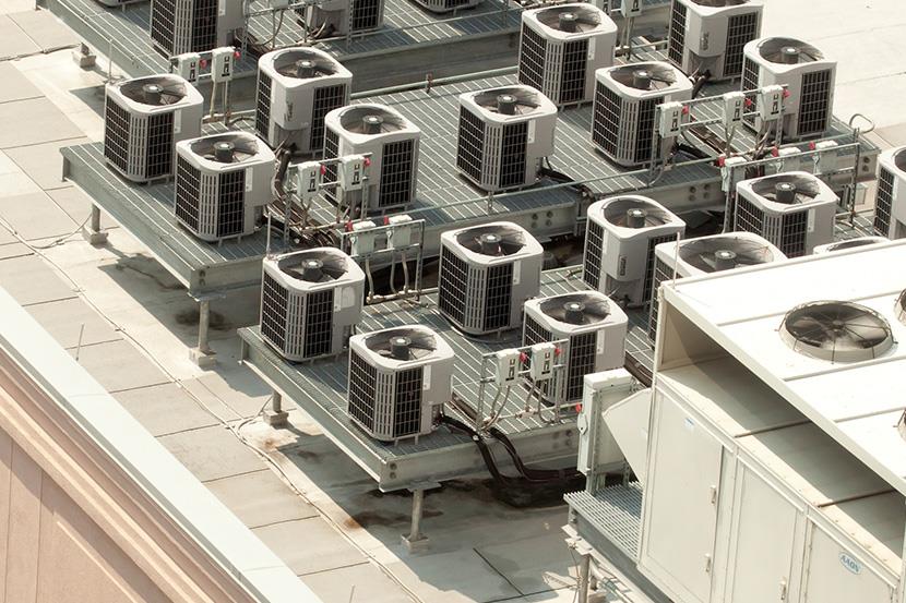 25 hvac units on building roof 