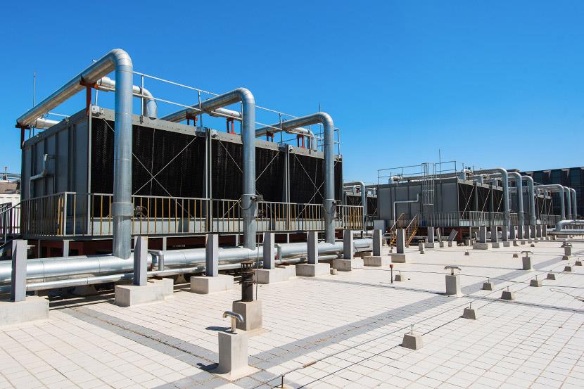 set of cooling towers on commercial building